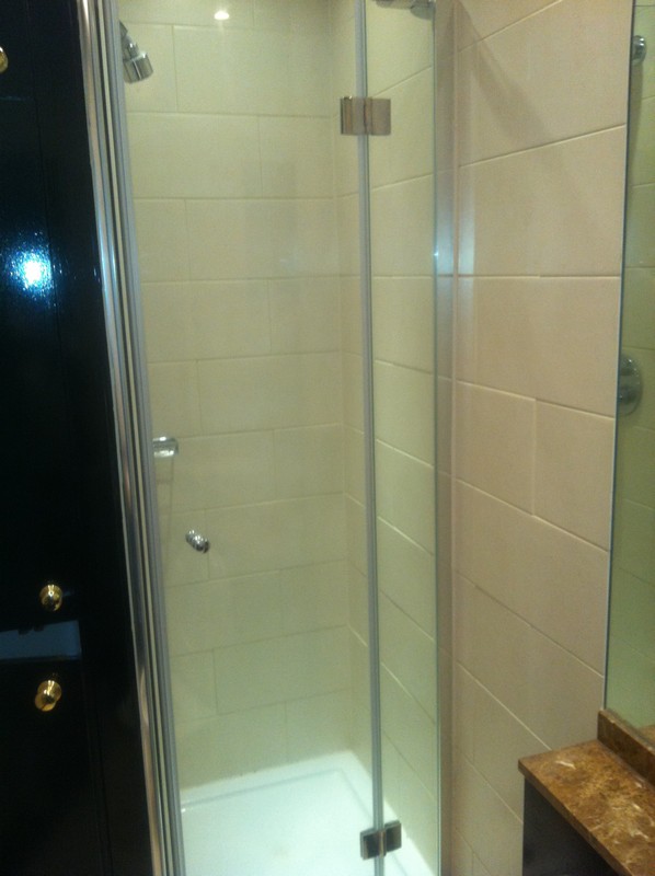 Frameless glass shower enclosure with chrome fittings in Regent's Park