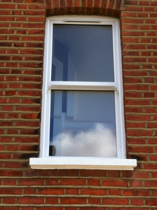 uPVC sash window on Victorian red brick house in Regent's Park